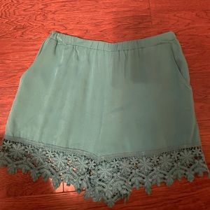 Green shorts with lace bottom